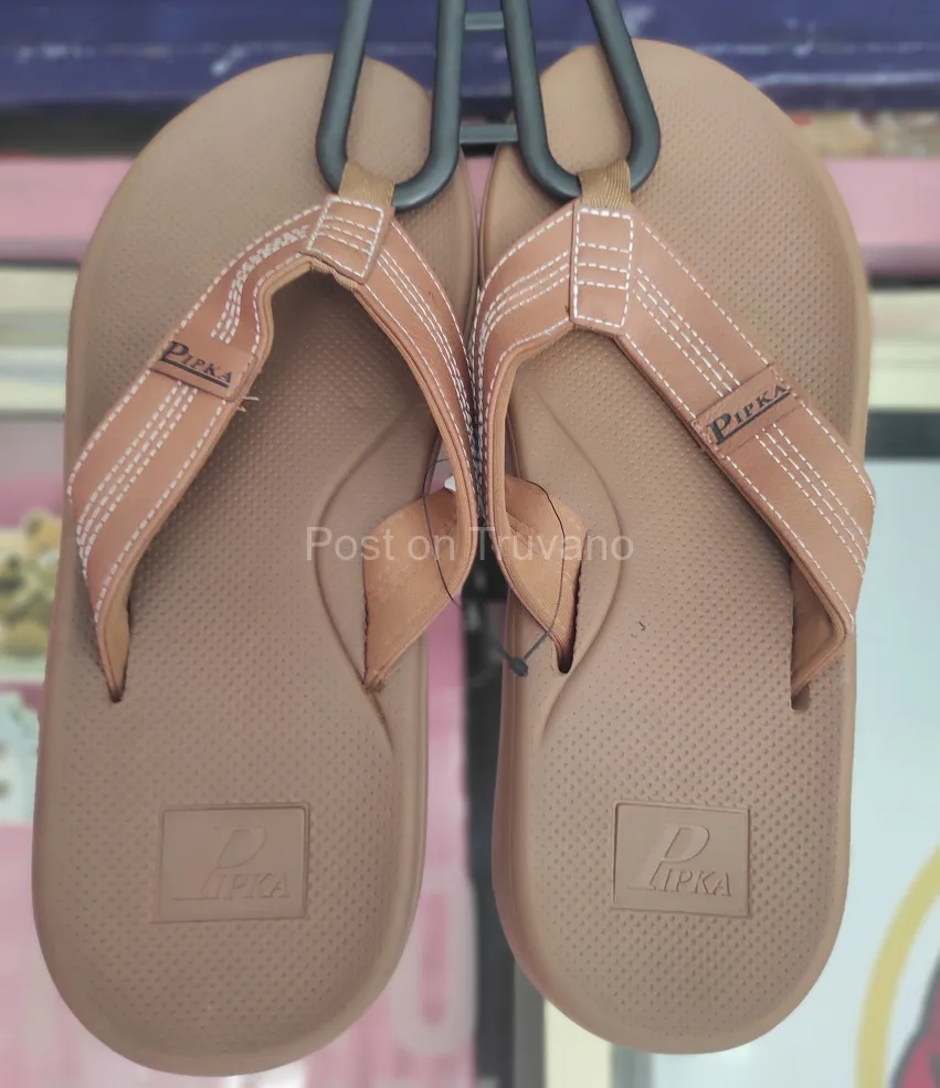 Brown branded flip flops